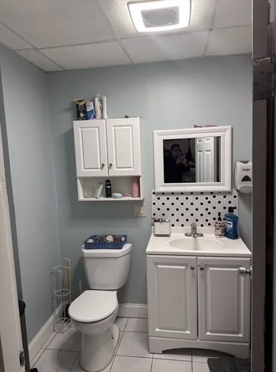 1656 North Shore Road, Unit 1 Revere, MA 02151 - Photo 12 of 18 a bathroom with a stove a sink and a mirror