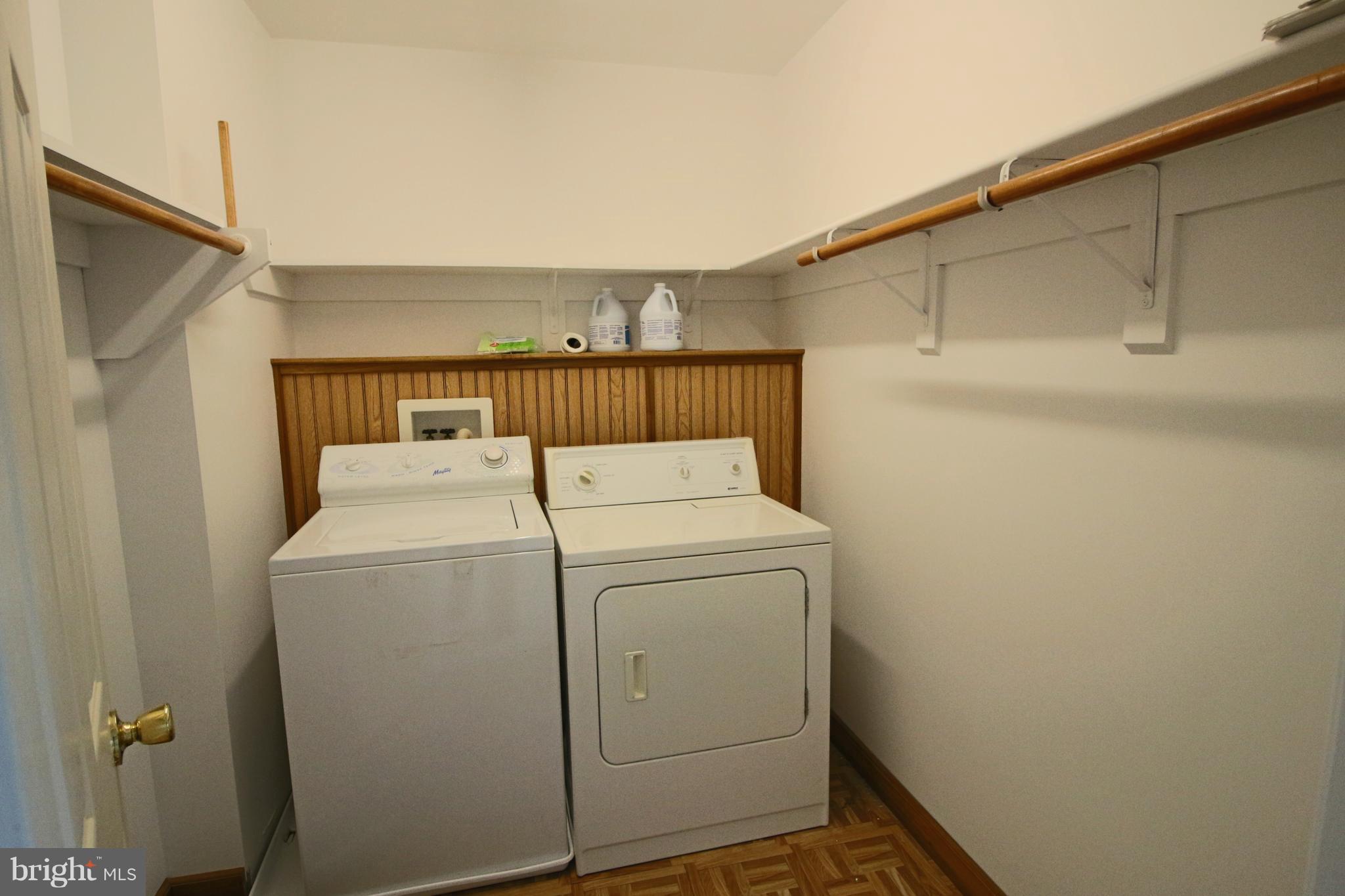 231 Deale Road Tracys Landing, MD 20779 - Photo 22 of 43 a utility room with dryer and washer