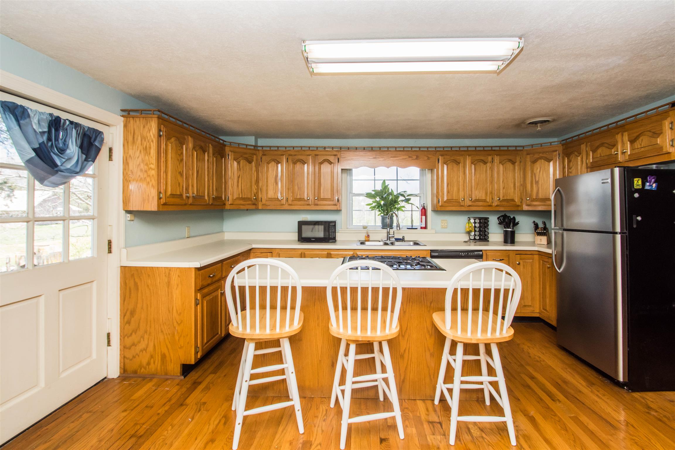 1810 Bend Road Clarksville, TN 37040 - Photo 8 of 17 a bed sitting in a kitchen next to a window