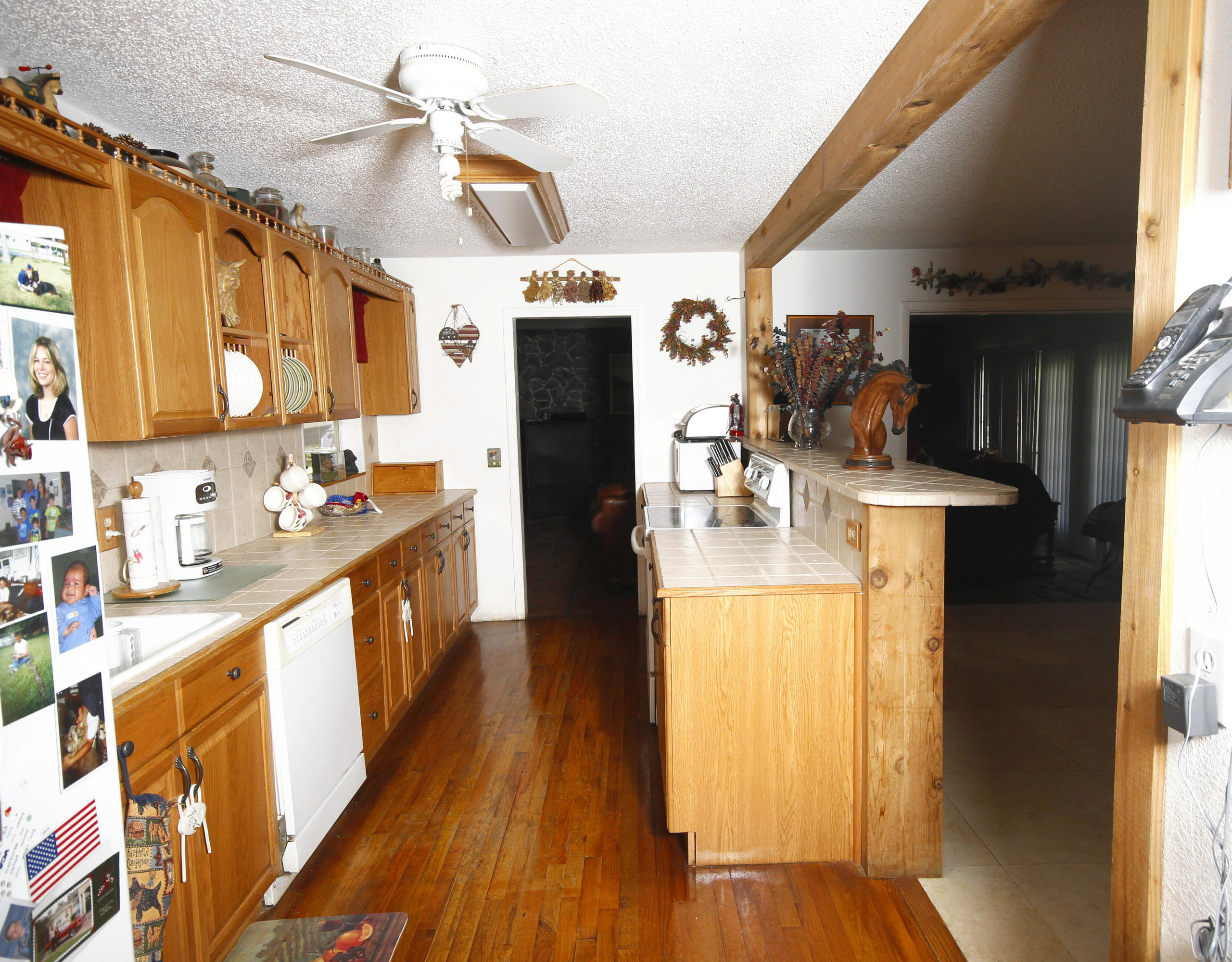 2556 C Road Loxahatchee, FL 33470 - Photo 12 of 27 Updated kitchen with Hard Wood Flooring