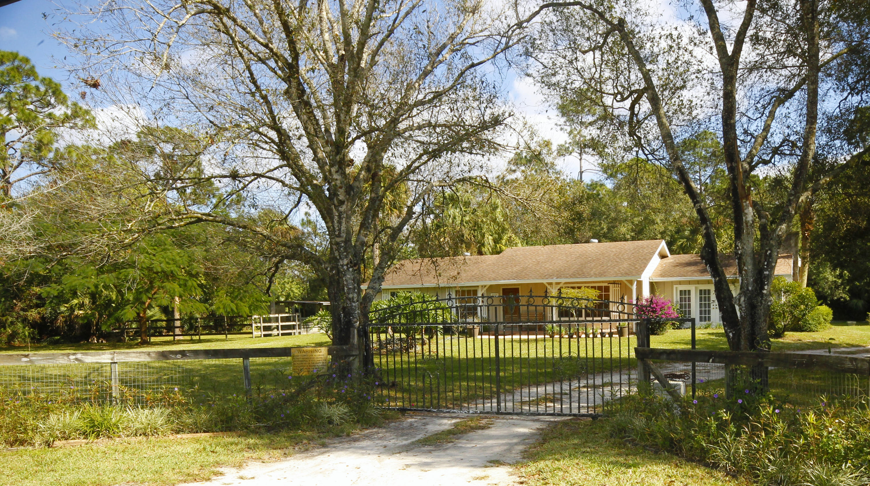 2556 C Road Loxahatchee, FL 33470 - Photo 27 of 27 Gated Entrance from Paved Road