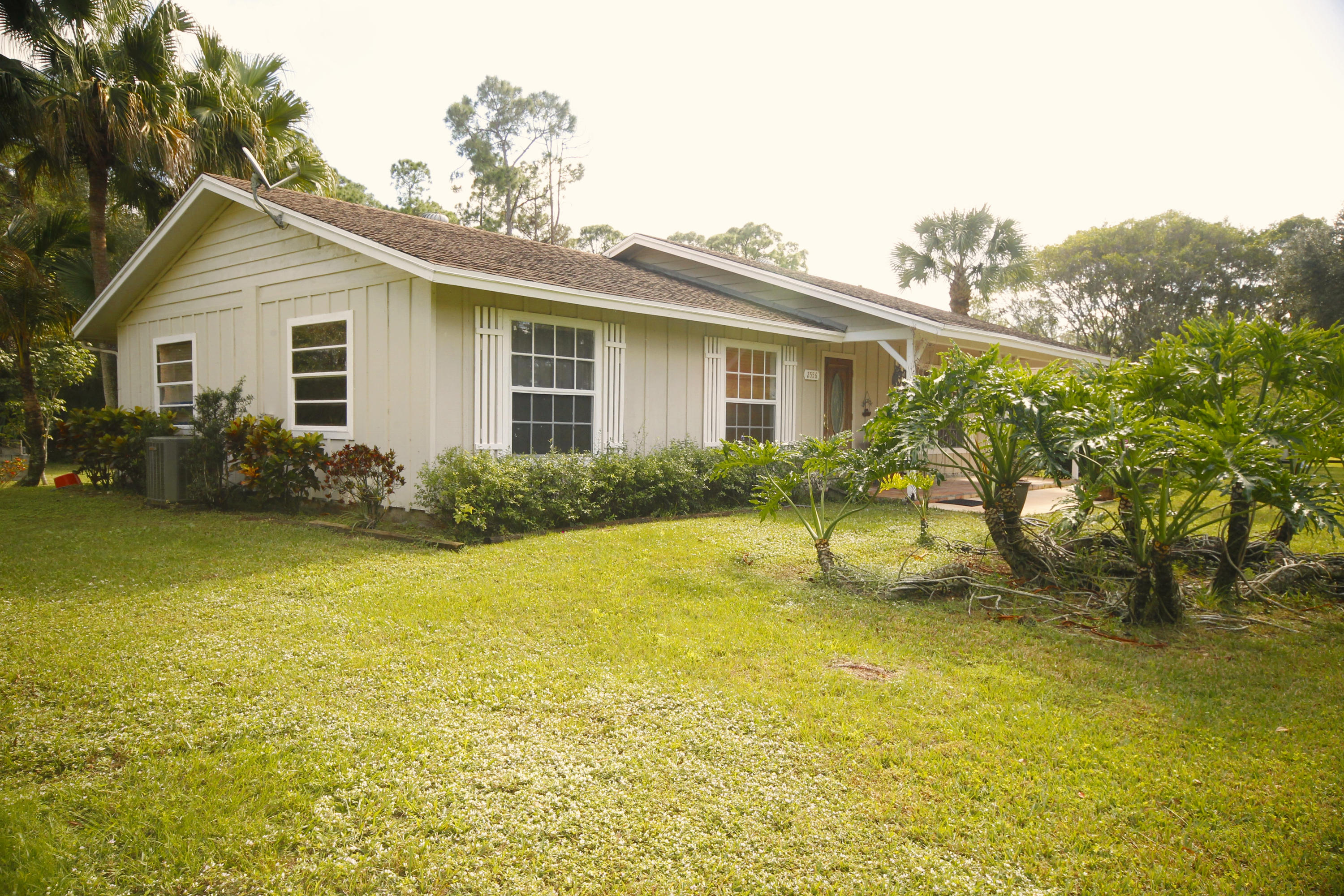 2556 C Road Loxahatchee, FL 33470 - Photo 3 of 27 Side Exterior