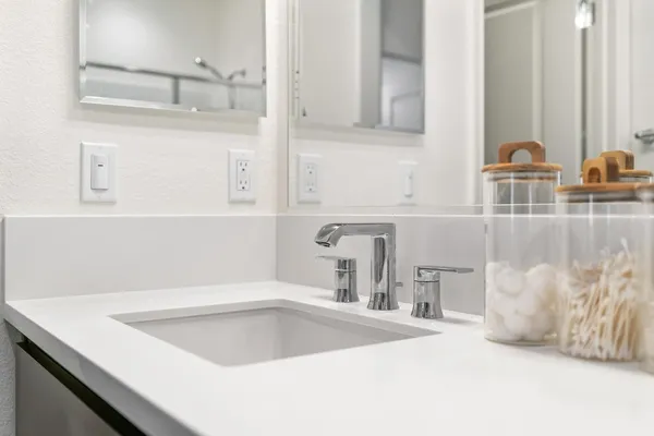 a bathroom with a shower and a bath tub