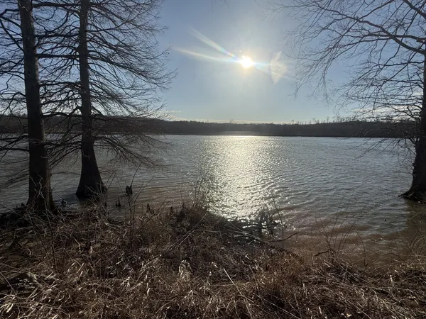 a view of outside space and a lake view
