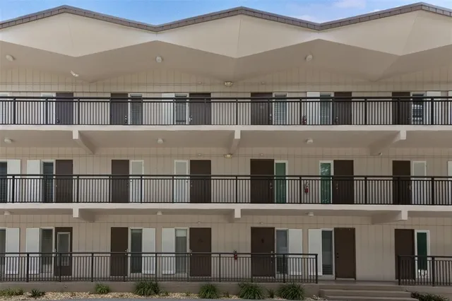 a view of a large white building