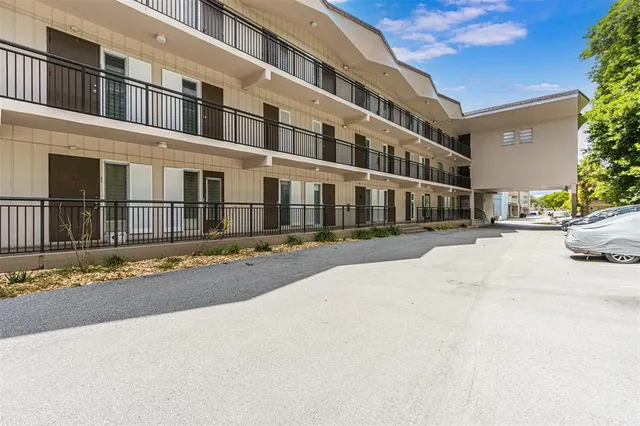 a view of a building with a street