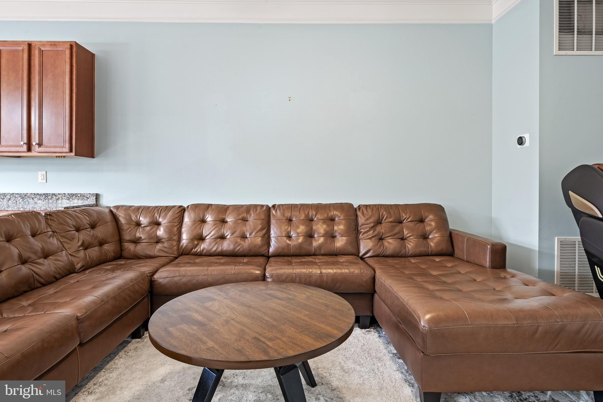 8722 Polished Pebble Way Laurel, MD 20723 - Photo 15 of 58 a living room with a couch