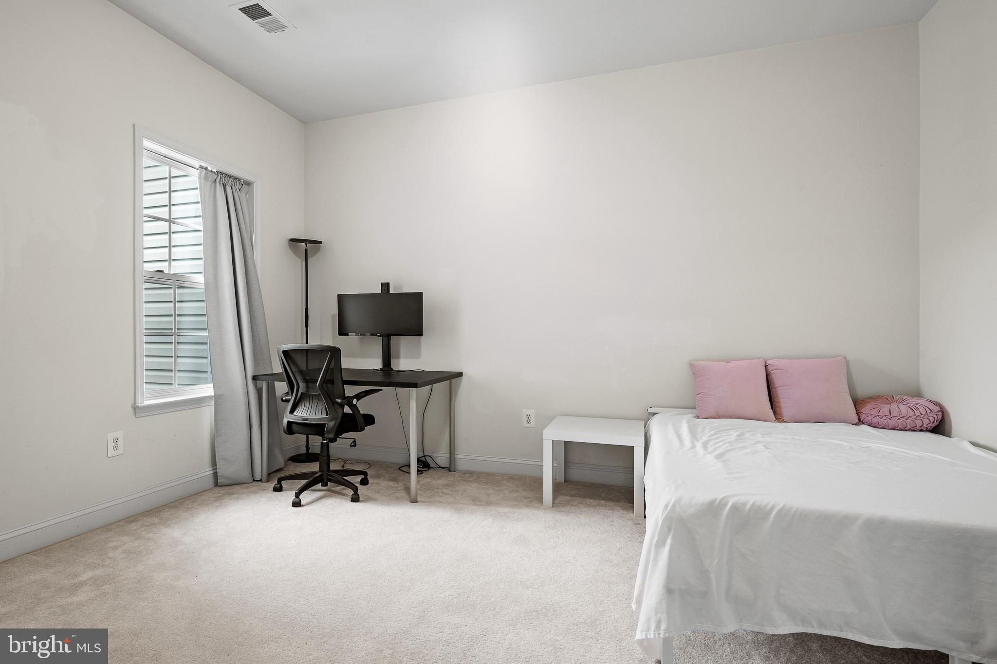 8722 Polished Pebble Way Laurel, MD 20723 - Photo 27 of 58 a bedroom with a workspace