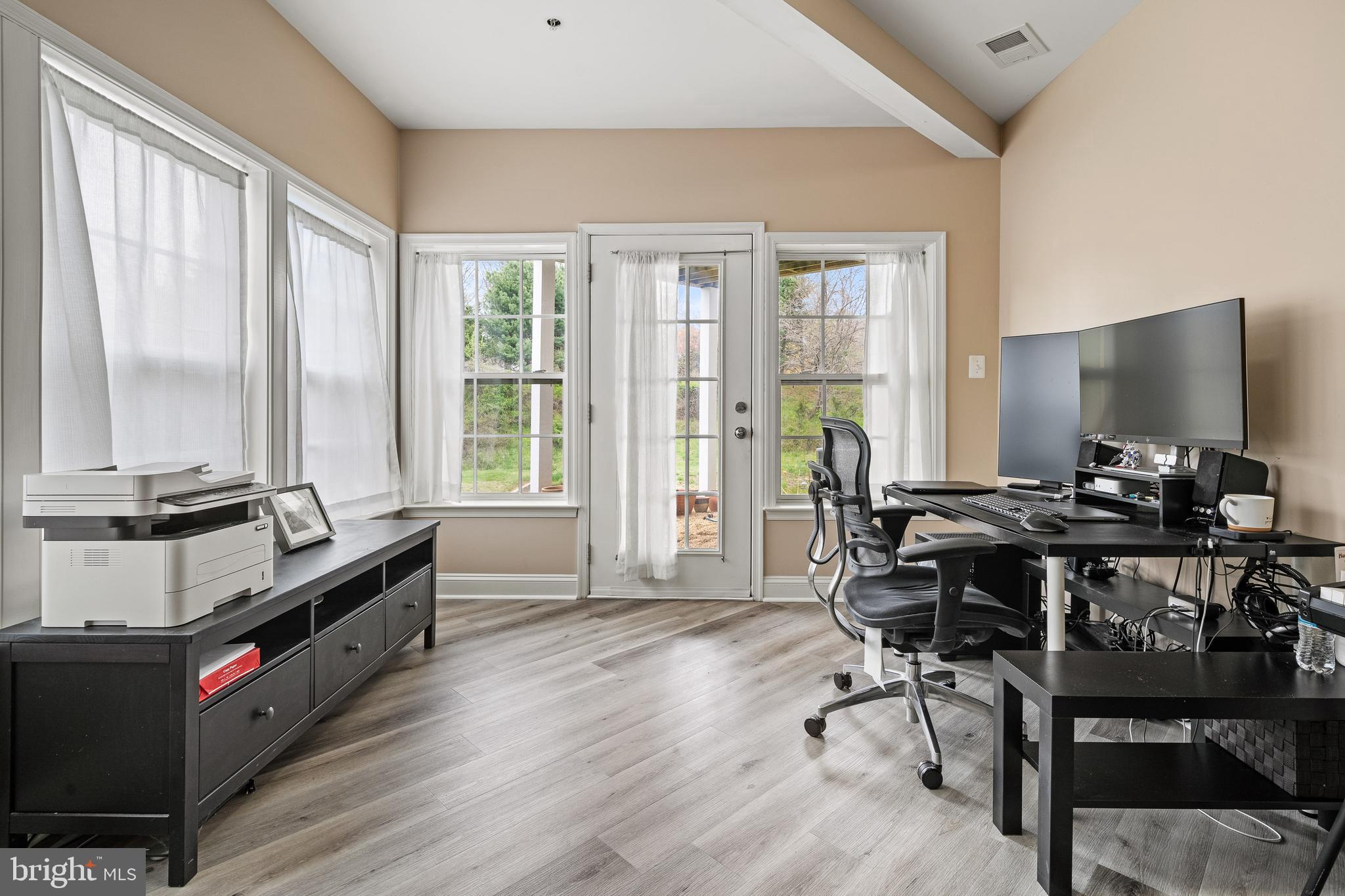 8722 Polished Pebble Way Laurel, MD 20723 - Photo 37 of 58 a view of a workspace with furniture and a window