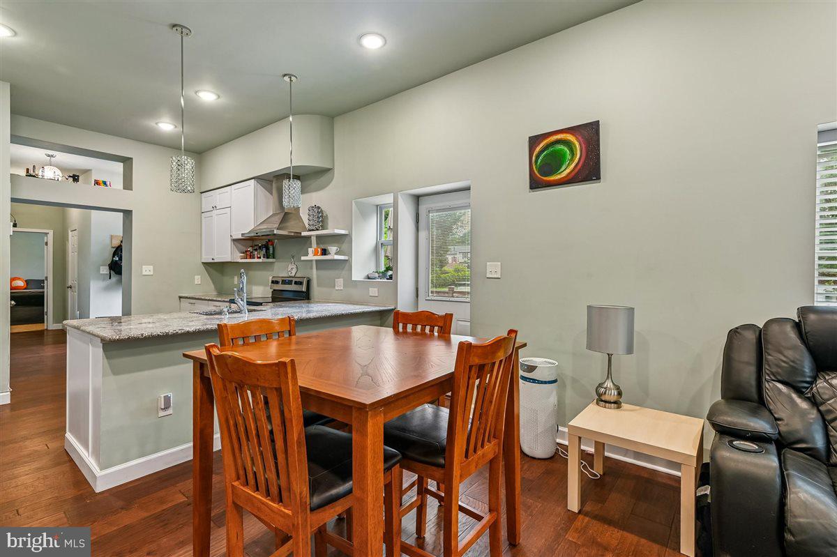 4316 Spencer Street Halethorpe, MD 21227 - Photo 8 of 30 Eating area to kitchen. Door to side deck.
