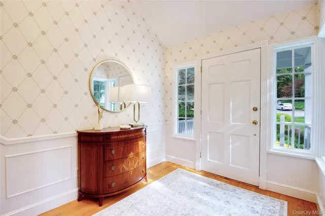 a view of a livingroom with furniture and window