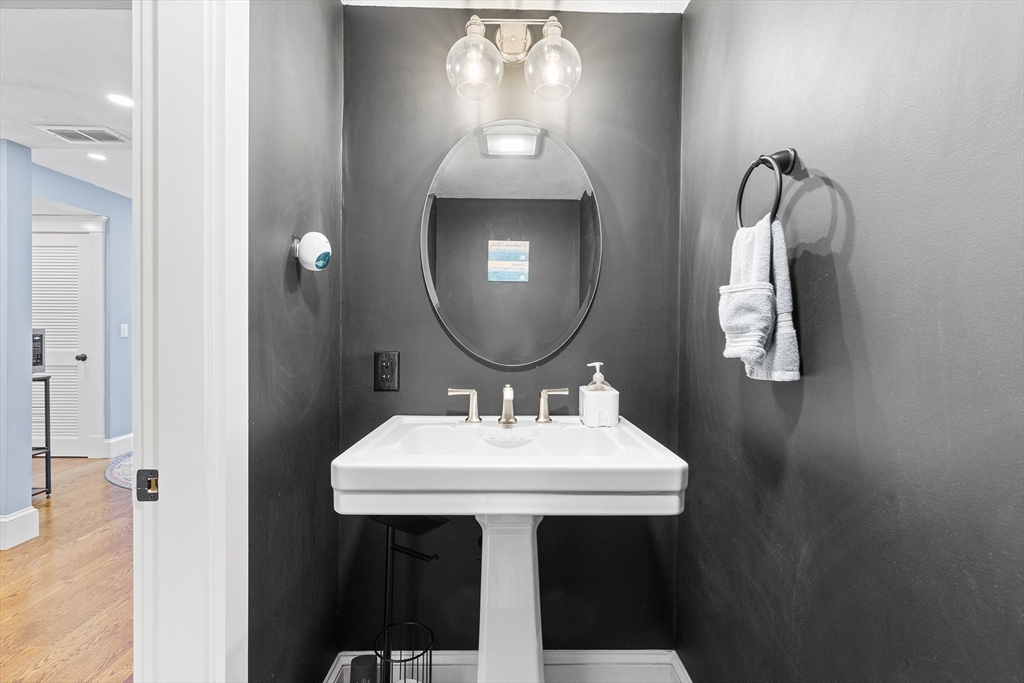 1100 Salem Street, Unit 93 Peabody, MA 01960 - Photo 12 of 27 a bathroom with a sink and a mirror