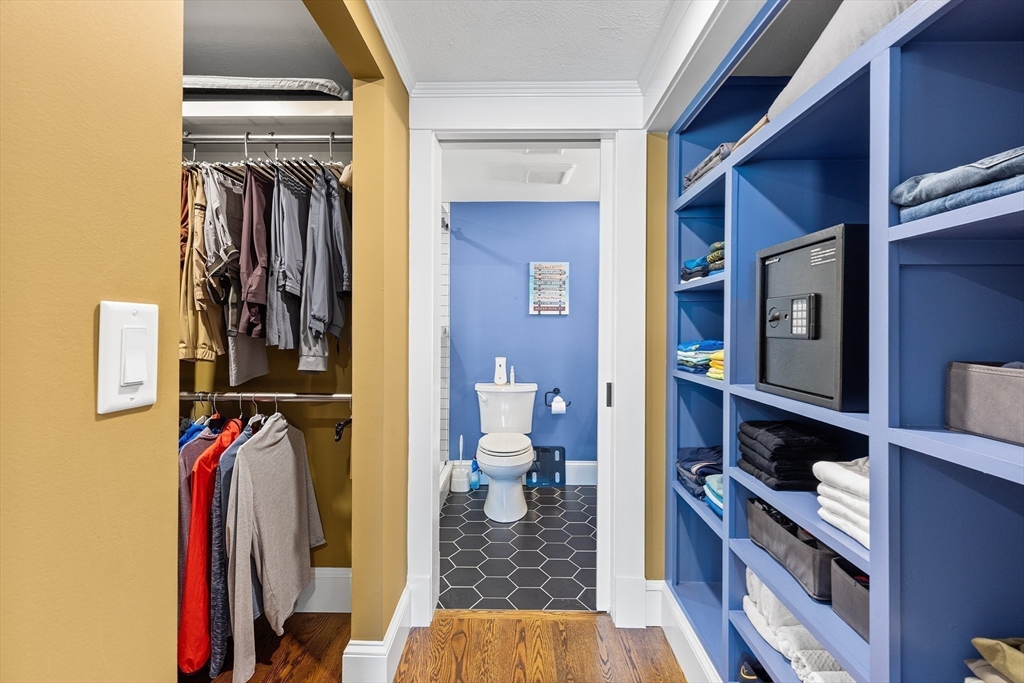 1100 Salem Street, Unit 93 Peabody, MA 01960 - Photo 17 of 27 a view of walk in closet with clothes and shoes