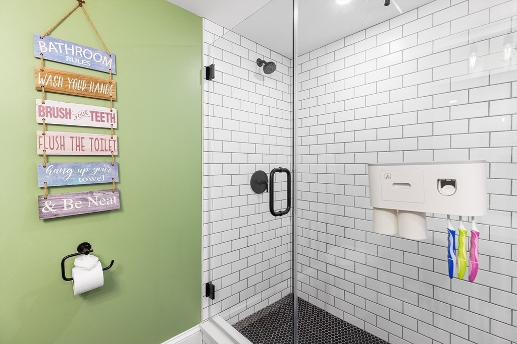 1100 Salem Street, Unit 93 Peabody, MA 01960 - Photo 24 of 27 a bathroom with a shower