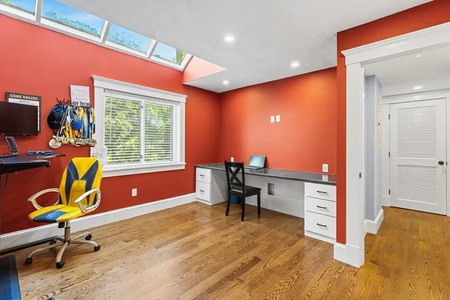 a workspace with furniture and window