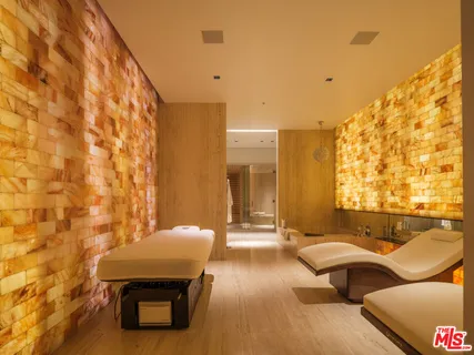 a bathroom with a tub and shower