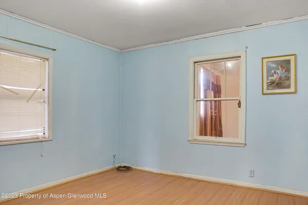 a view of small space with wooden floor