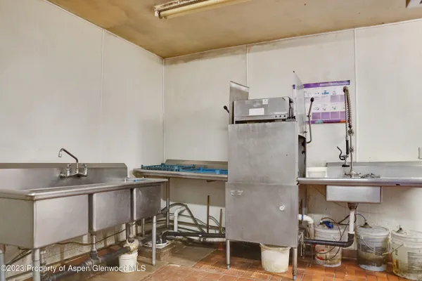 a bathroom with a tub and shower