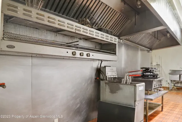 a view of a chairs with table in the patio