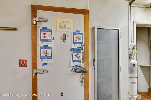 a street sign on a sidewalk