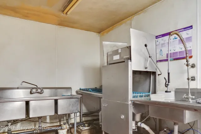 a front view of a house with a garage