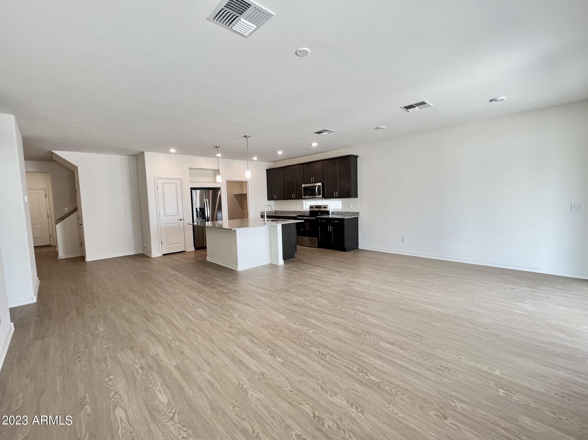 1750 Inca Drive Coolidge, AZ 85128 - Photo 3 of 23 GREAT-ROOM & KITCHEN