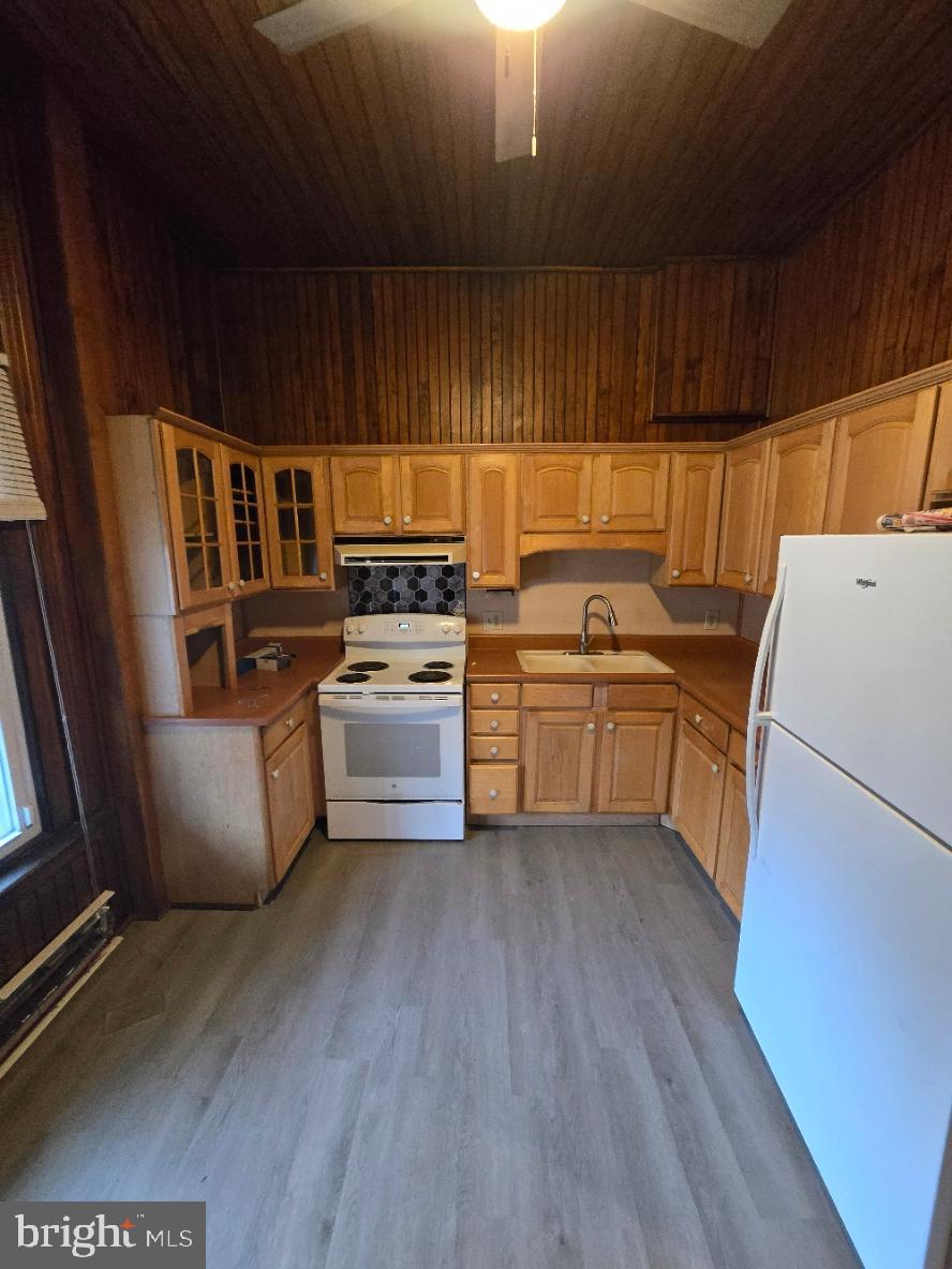 40 South 11th Street Lebanon, PA 17042 - Photo 4 of 11 a kitchen with a cabinets a sink and a stove