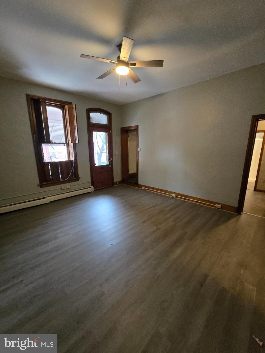 40 South 11th Street Lebanon, PA 17042 - Photo 6 of 11 an empty room with wooden floor and windows