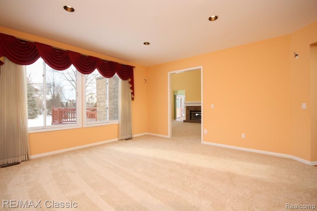 47790 Pavillon Road Canton, MI 48188 - Photo 14 of 45 The lving room overlooks the back yard.