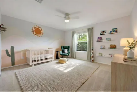 a bedroom with a bed and a cabinets