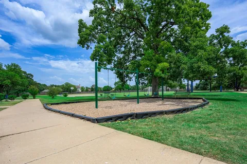 a view of a park with of trees