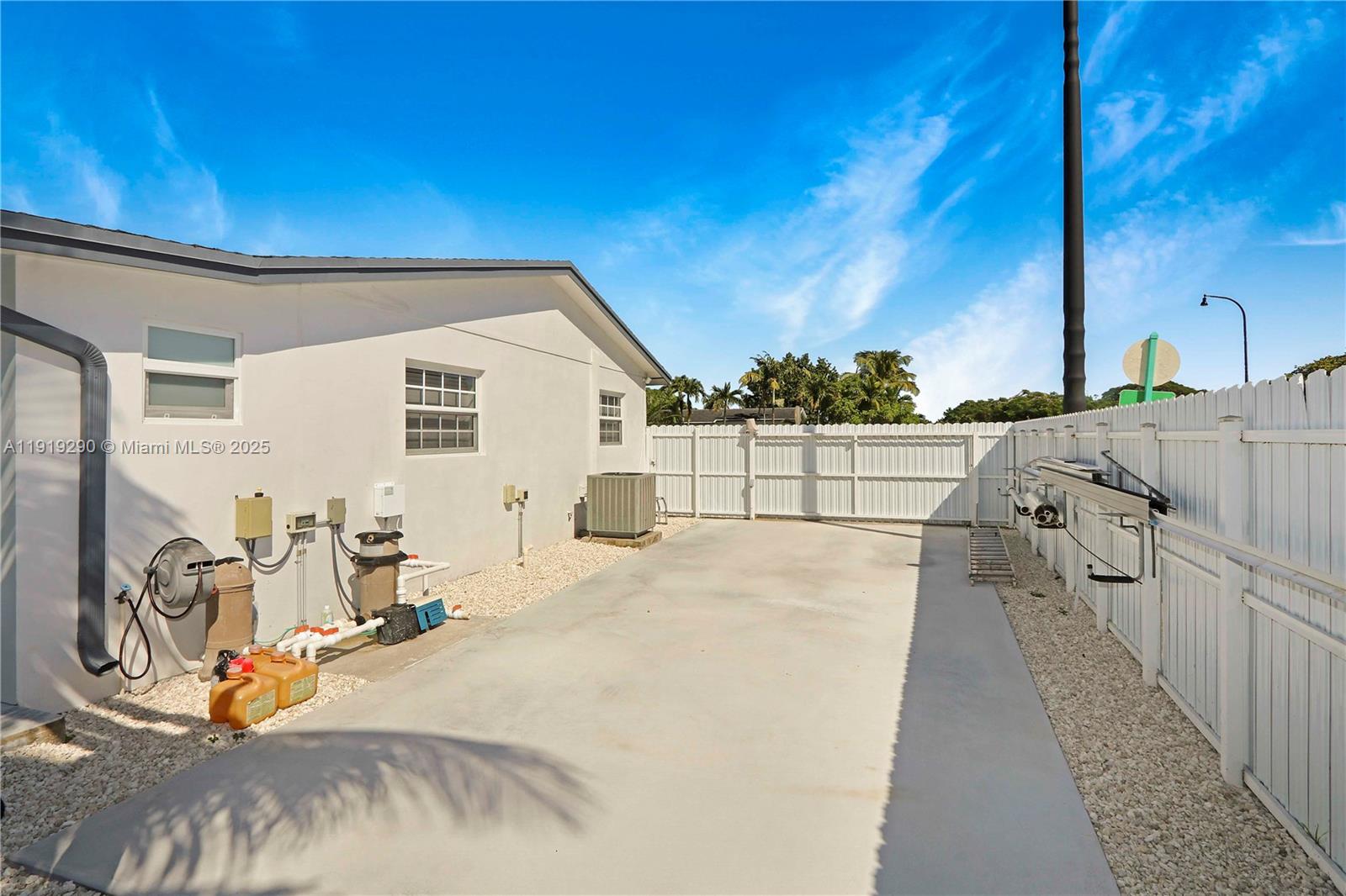 15440 Southwest 102nd Place Miami, FL 33157 - Photo 21 of 30 a view of a backyard with sitting area