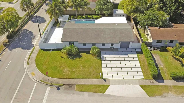 an aerial view of a swimming pool