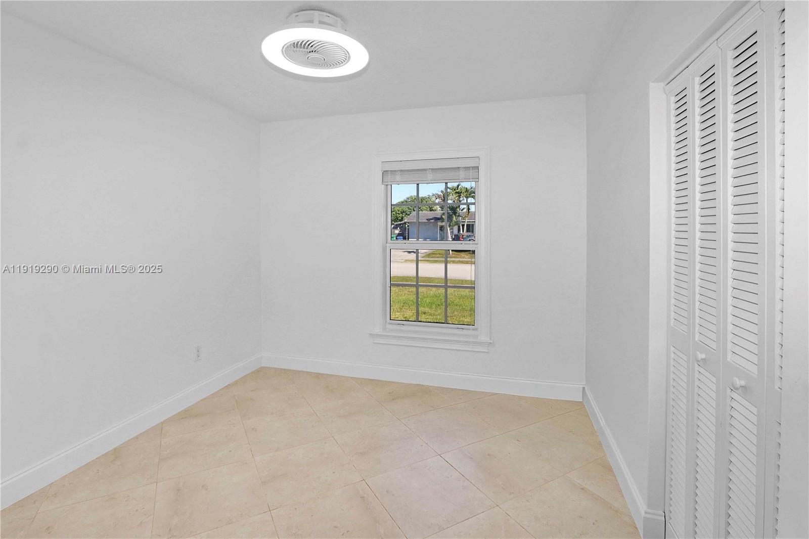 15440 Southwest 102nd Place Miami, FL 33157 - Photo 10 of 30 an empty room with a window