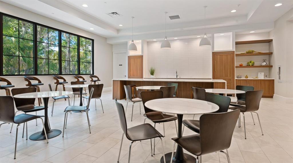 5107 Greencroft Road, Unit 23 Sarasota, FL 34235 - Photo 26 of 35 a view of a dining room with furniture window and outside view