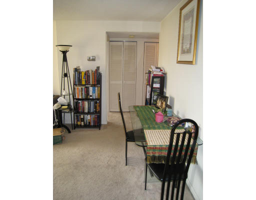 20 Webster Street, Unit 401 Brookline, MA 02446 - Photo 4 of 7 a view of a livingroom with furniture and entryway