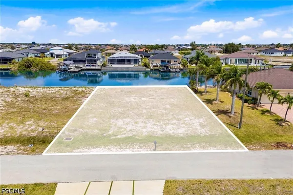 a view of a swimming pool with an ocean view