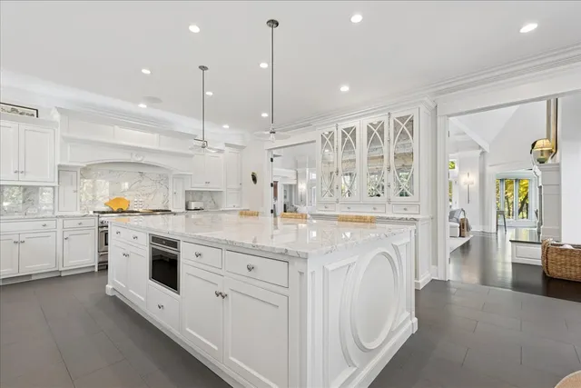 a living room with furniture and next to a window