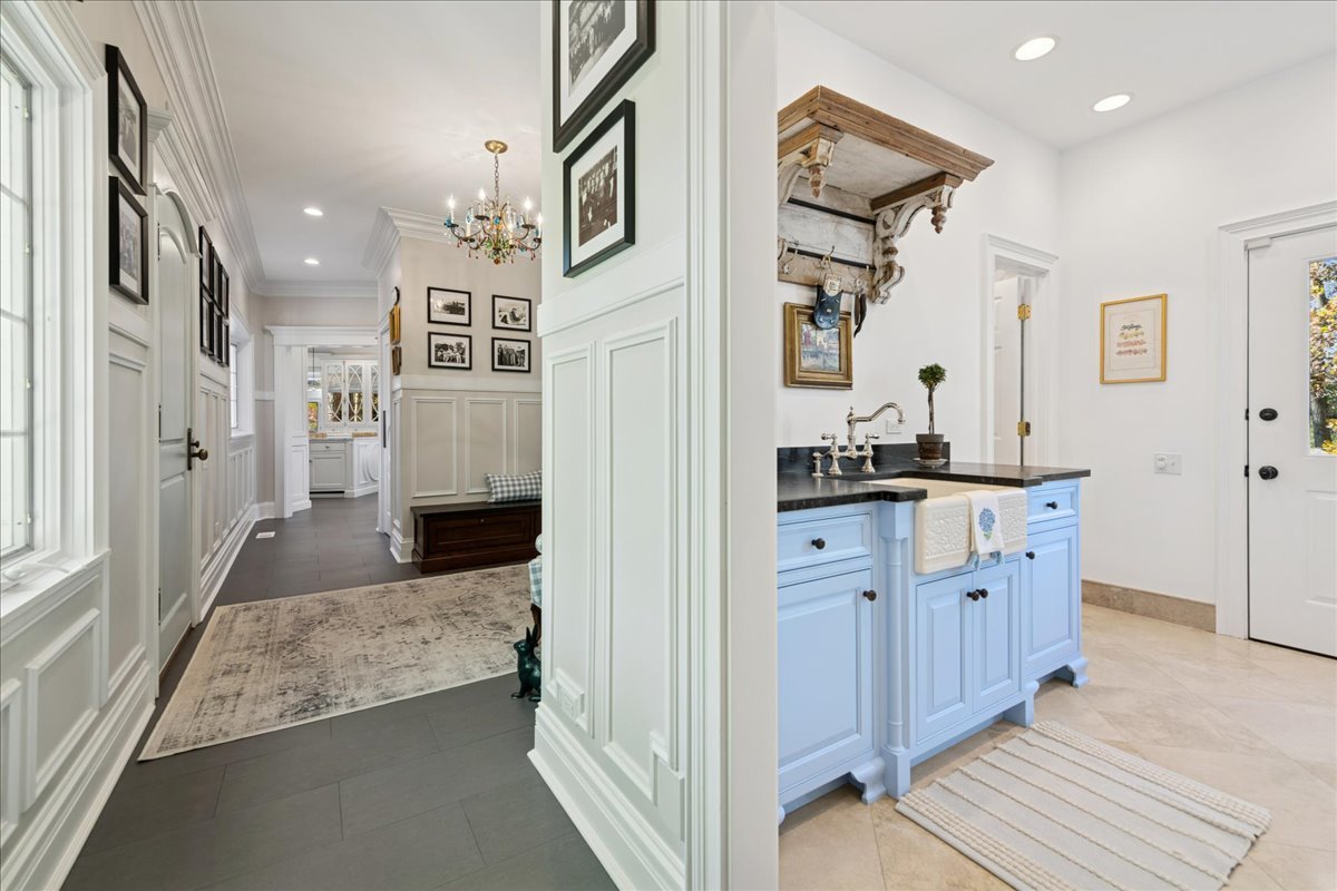 166 North Buckley Road Barrington Hills, IL 60010 - Photo 30 of 86 a bathroom with a granite countertop sink a mirror and a shower