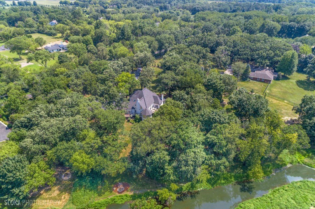 166 North Buckley Road Barrington Hills, IL 60010 - Photo 3 of 86 a view of a house with a yard