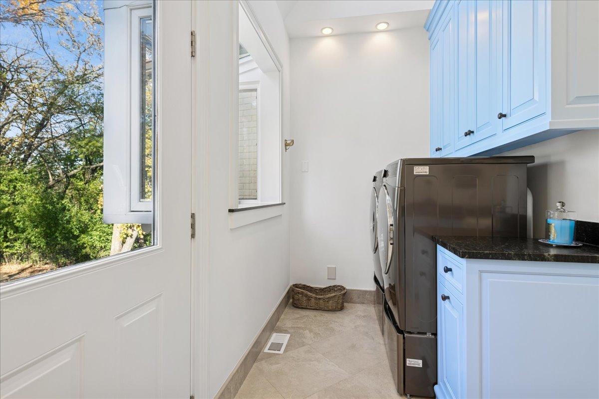 166 North Buckley Road Barrington Hills, IL 60010 - Photo 33 of 86 a kitchen with stainless steel appliances a stove and a refrigerator