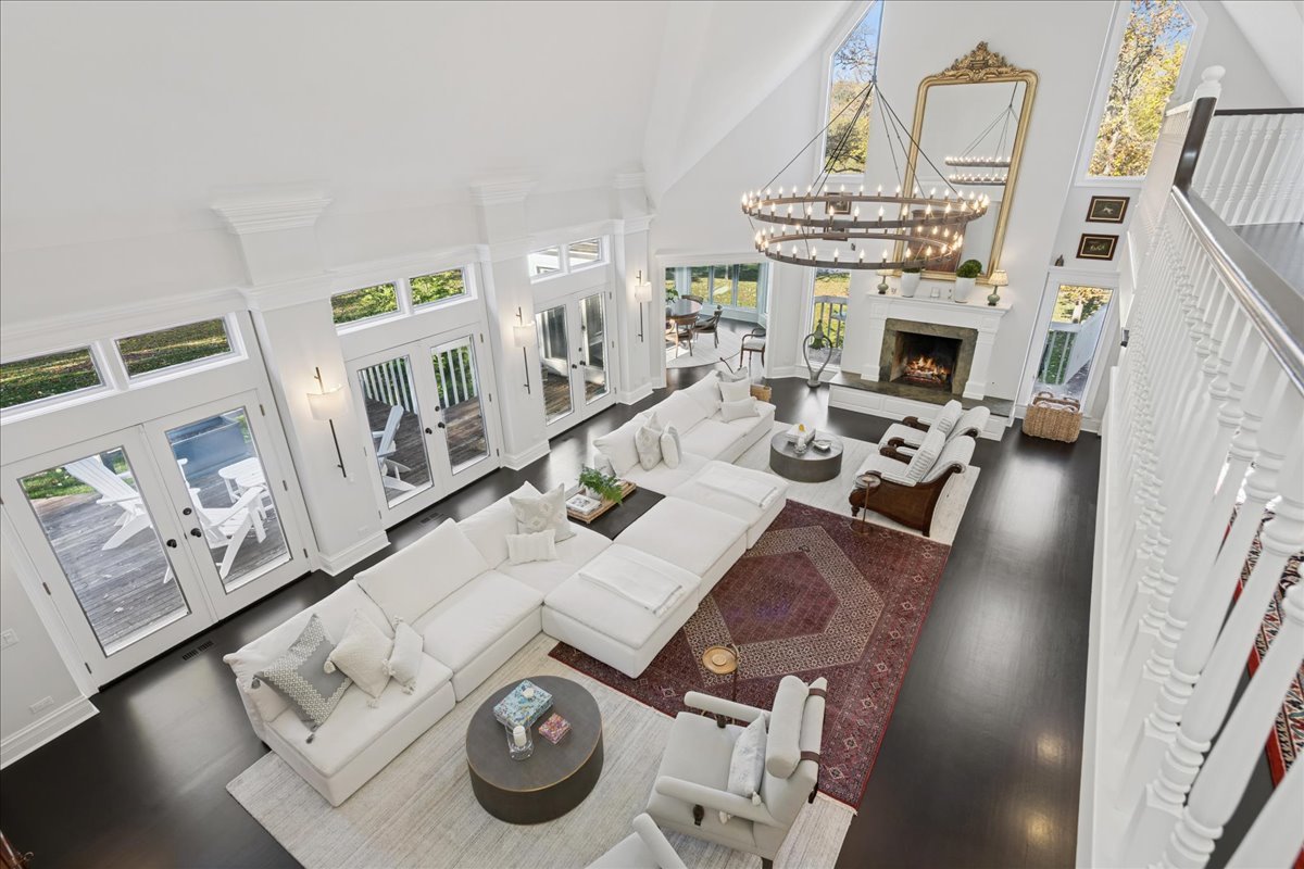 166 North Buckley Road Barrington Hills, IL 60010 - Photo 47 of 86 a living room with furniture and fireplace