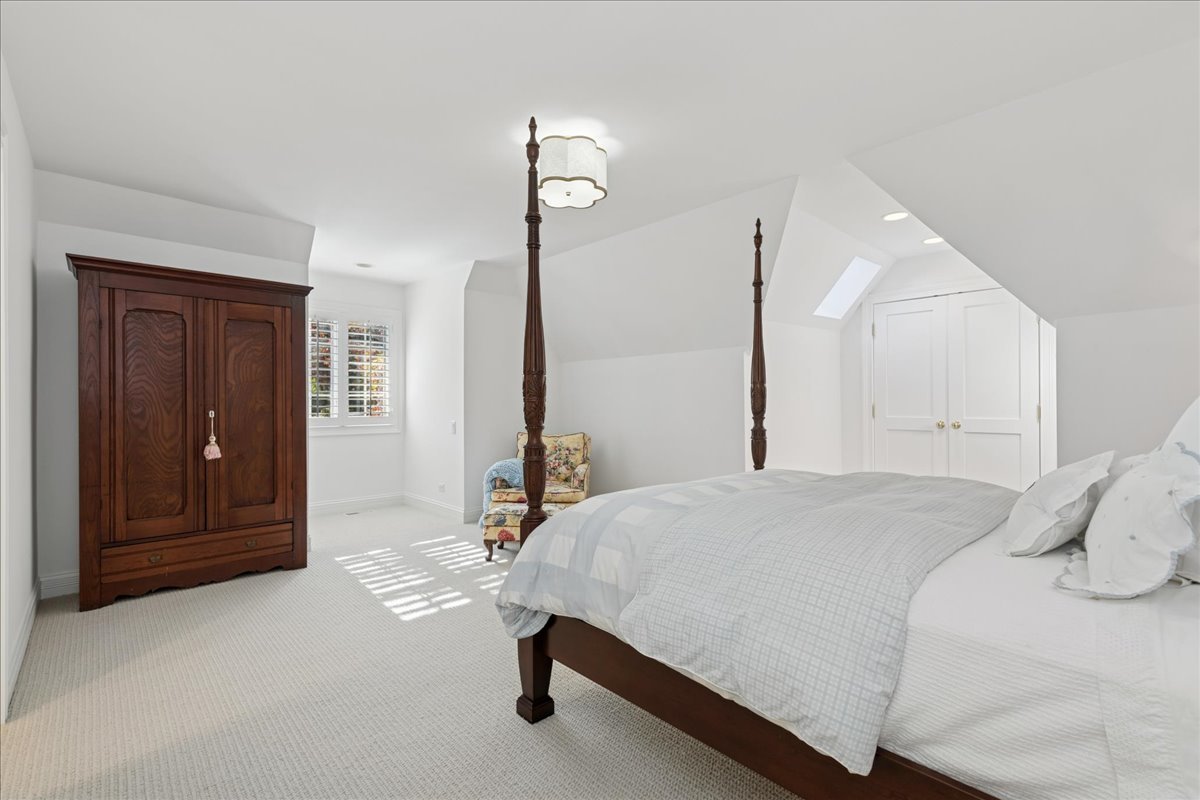 166 North Buckley Road Barrington Hills, IL 60010 - Photo 53 of 86 a bedroom with a bed and a dresser