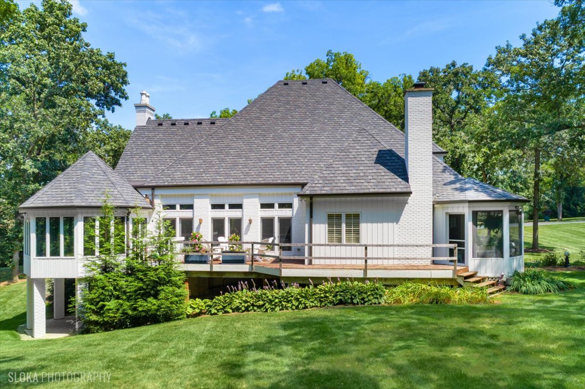 166 North Buckley Road Barrington Hills, IL 60010 - Photo 69 of 86 a front view of a house with a yard