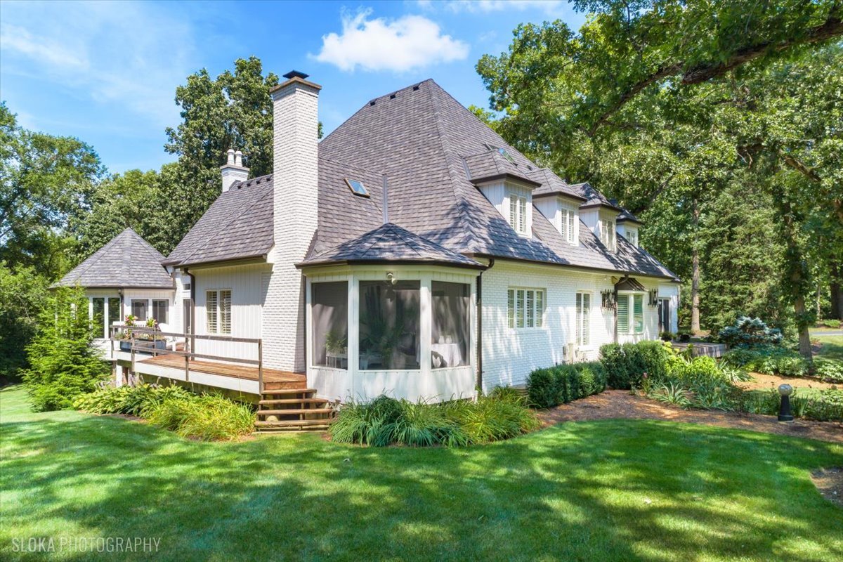 166 North Buckley Road Barrington Hills, IL 60010 - Photo 71 of 86 a view of a house with a yard plants and large tree