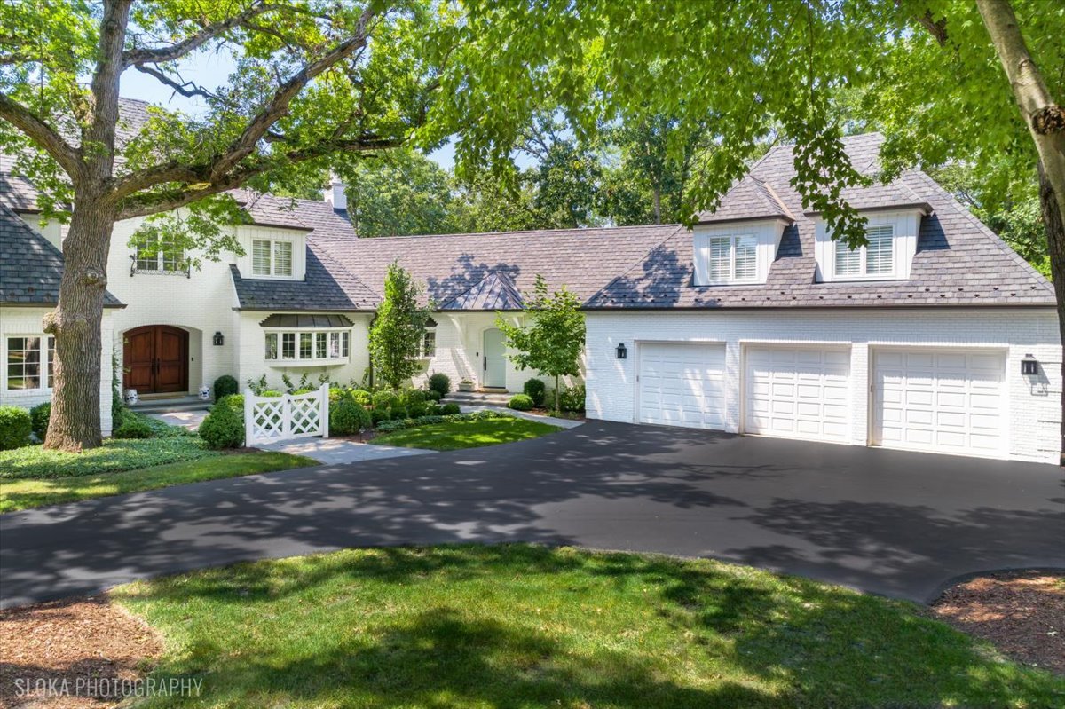166 North Buckley Road Barrington Hills, IL 60010 - Photo 72 of 86 a view of a house with a yard and large tree