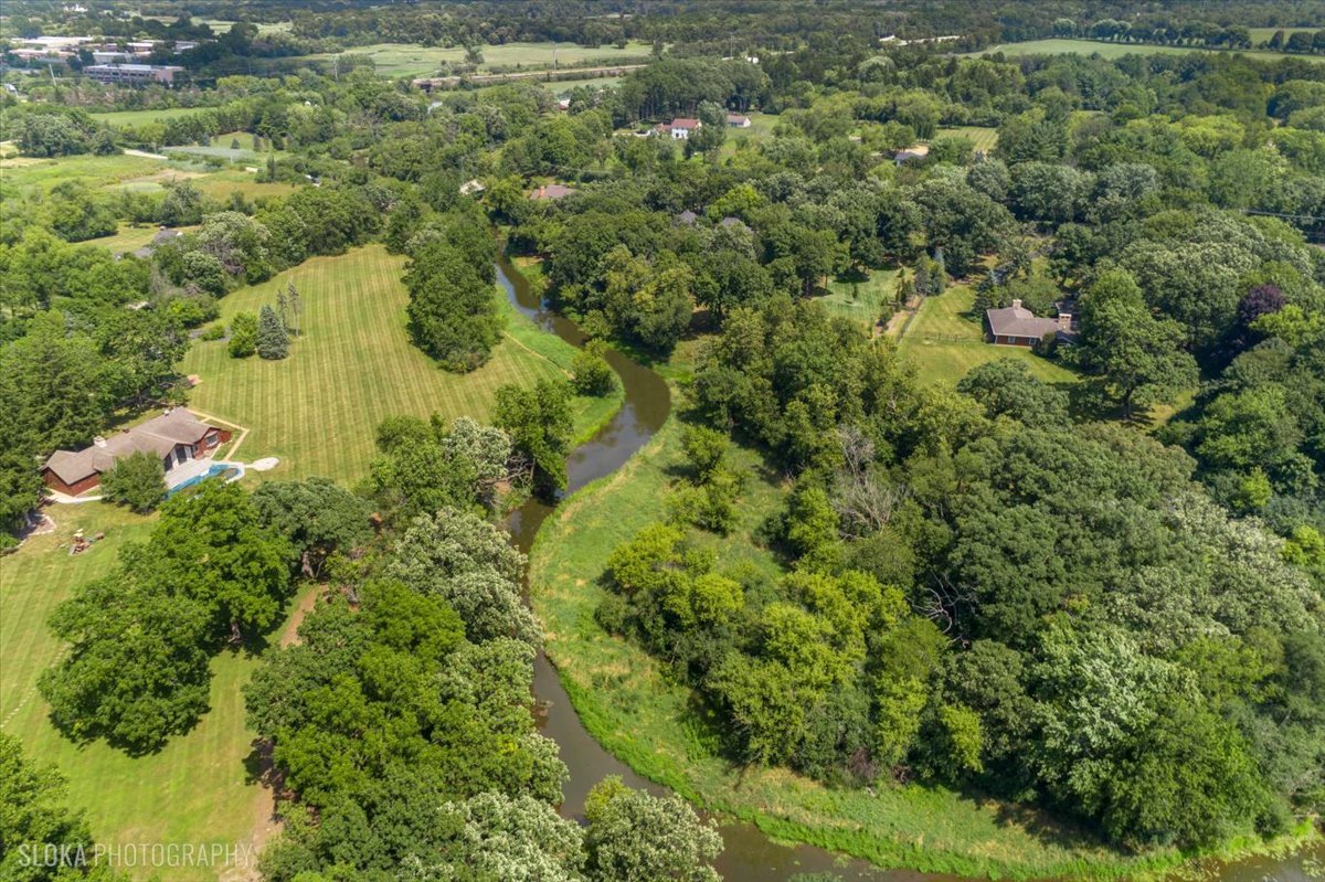 166 North Buckley Road Barrington Hills, IL 60010 - Photo 78 of 86 an aerial view of residential house with outdoor space and trees all around