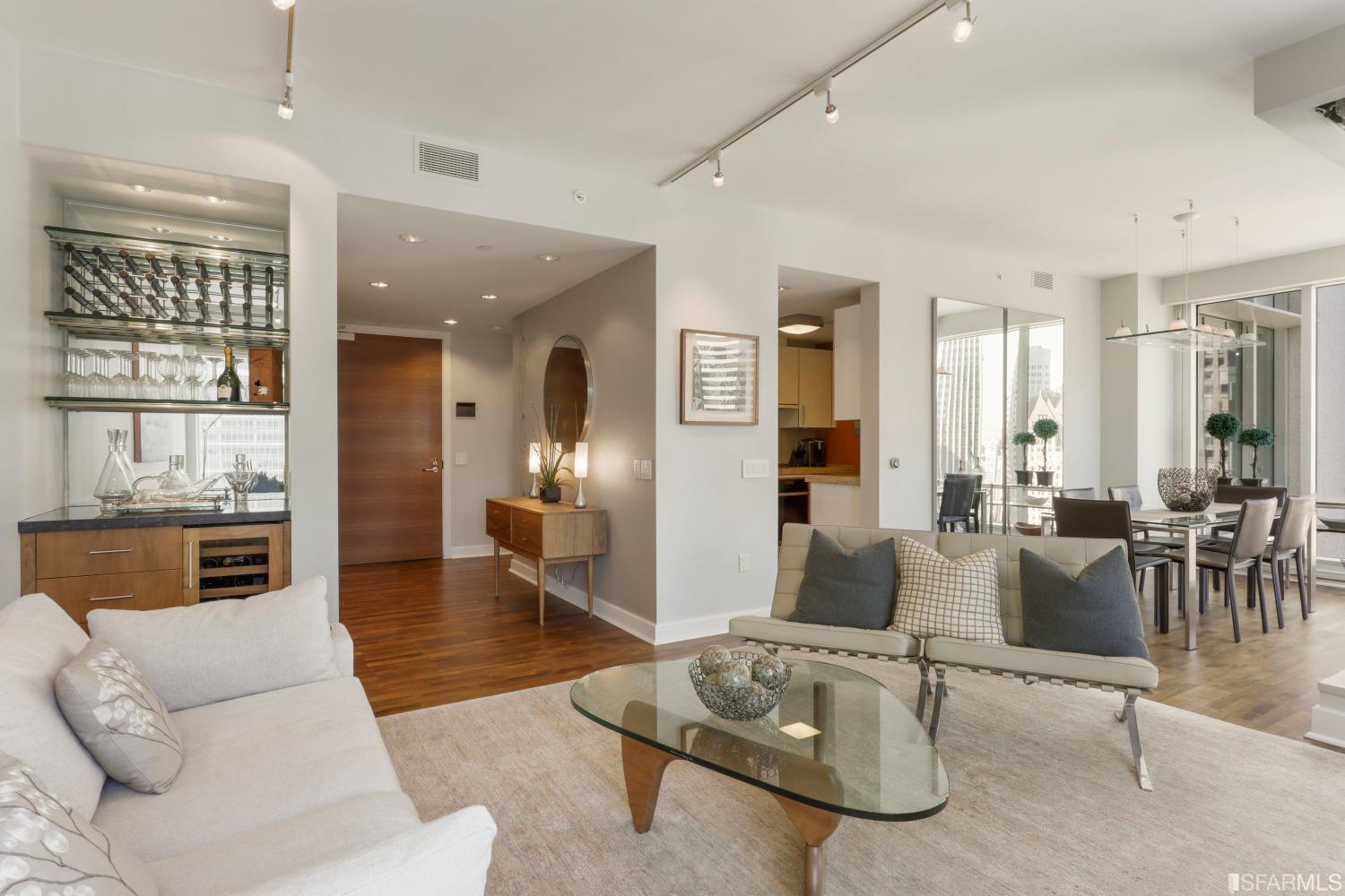 188 Minna, Unit 22A San Francisco, CA 94105 - Photo 1 of 28 a living room with furniture and view of kitchen