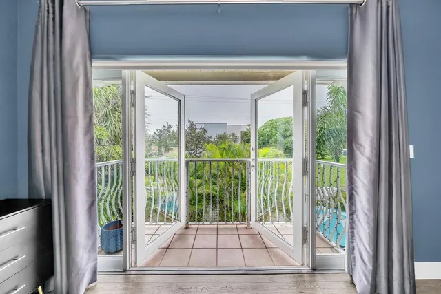 a view of a balcony with an outdoor space