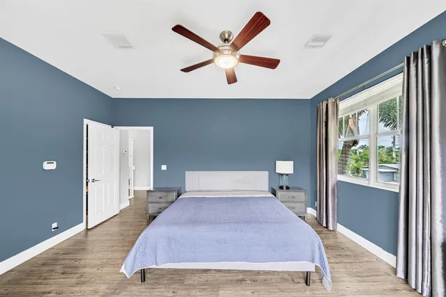 a bathroom with a shower and a toilet